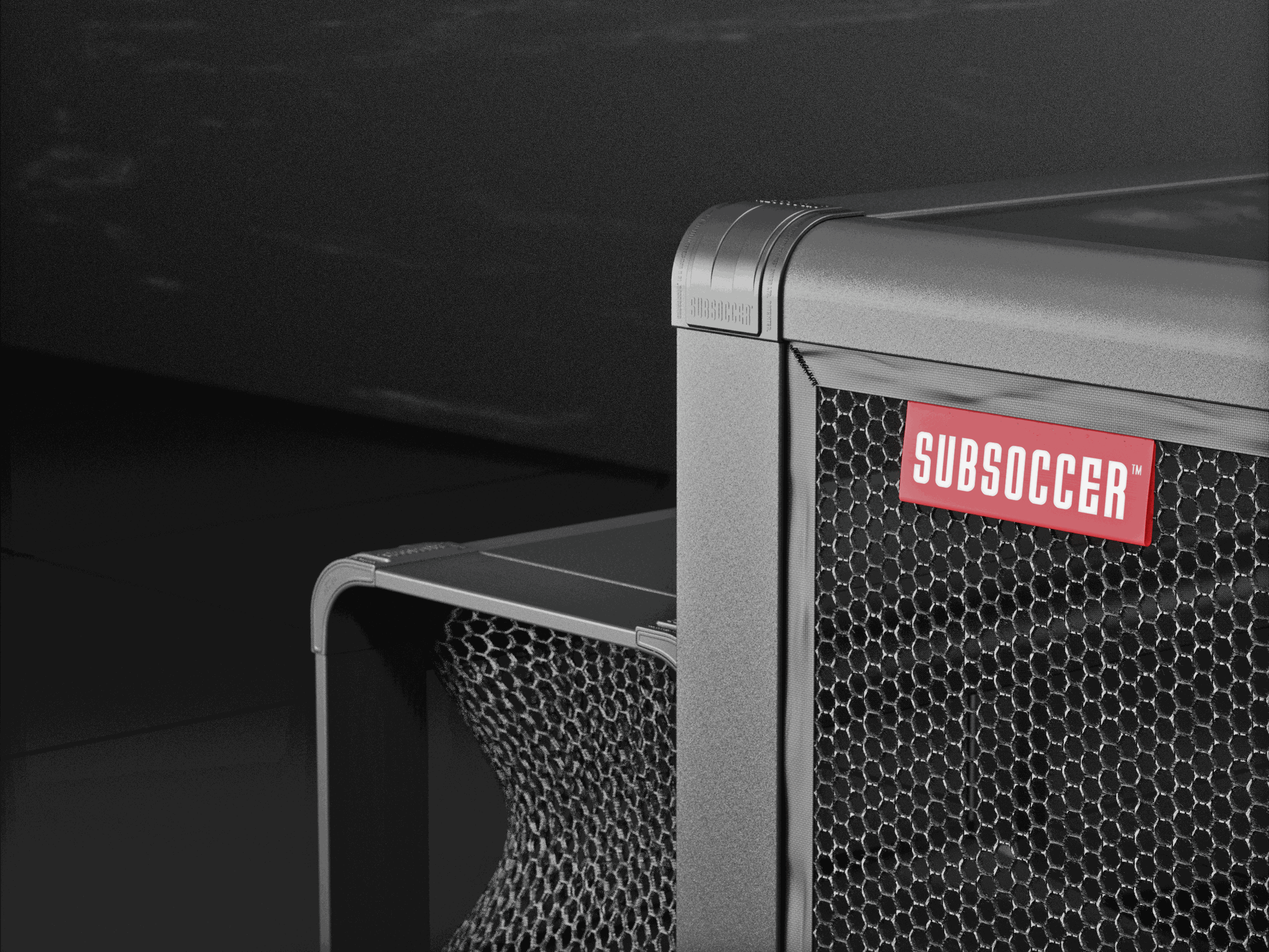 Close-up of Subsoccer S7 durable game bench with hexagonal netting and Subsoccer logo in modern design for indoor and outdoor use.